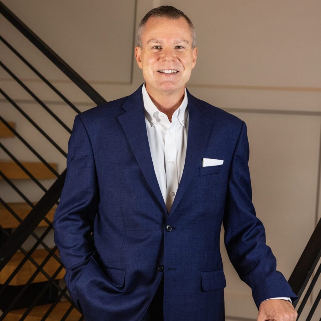 Business man on a modern stair case